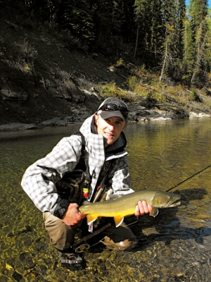 Tim Tchir with a hefty bull trout caught on the streamer