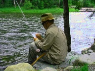 Andy Tchir writing stream-side